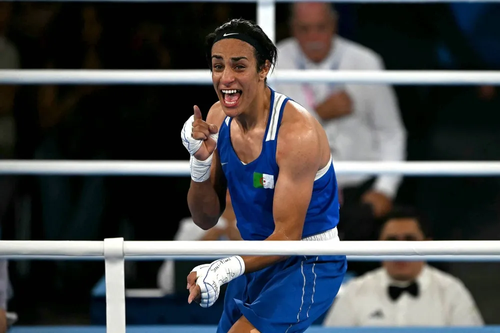 Boxer Khelif puts gender dispute aside to reach final as fans flock to  support her - The Japan Times