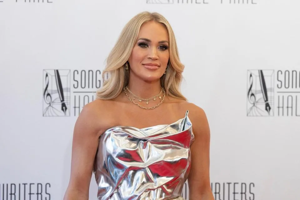 Carrie Underwood Looks 'Tense' And 'Serious' In First Public Appearance  Since Inauguration Day Performance