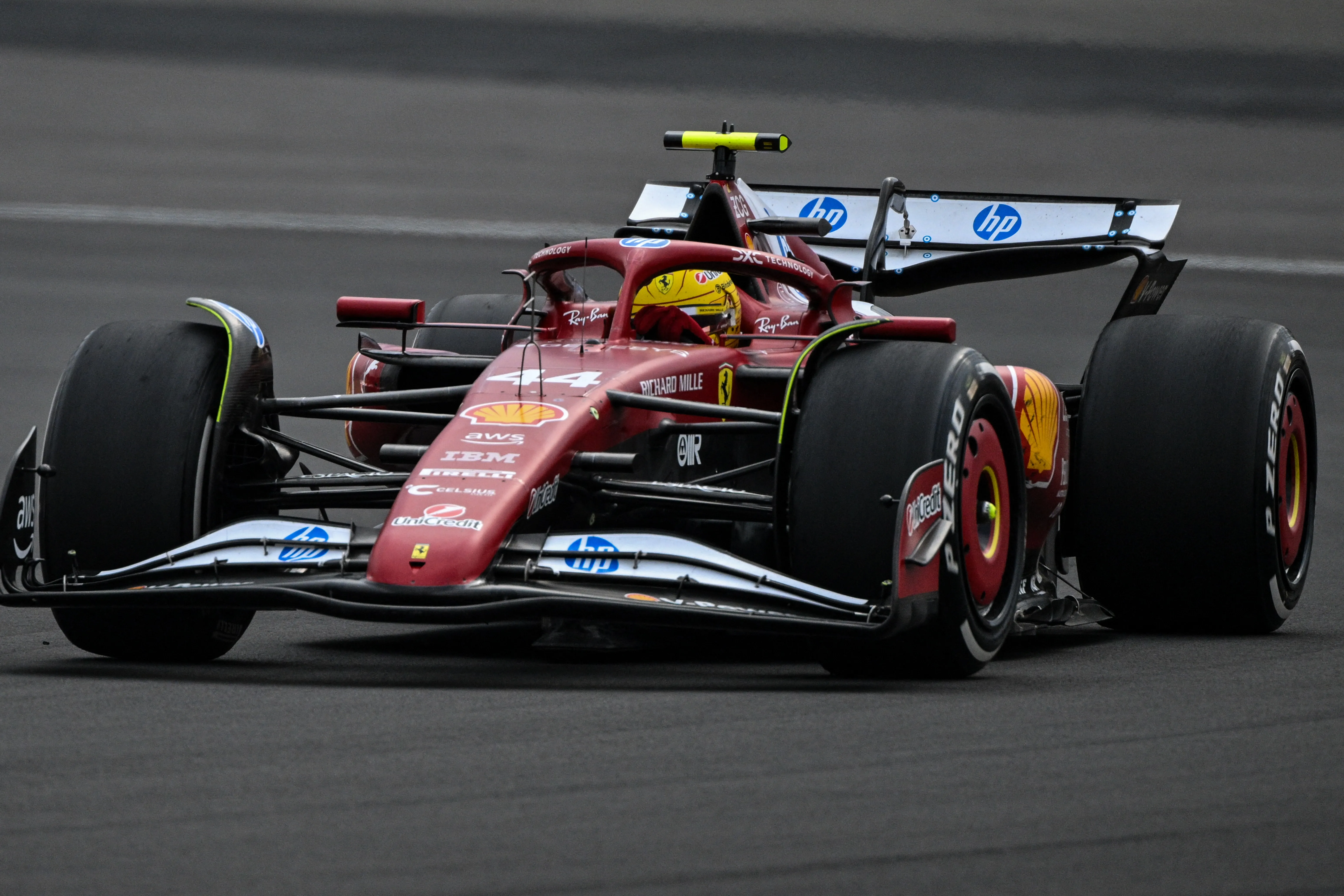 Lewis Hamilton driving a Ferrari Formula One race car.